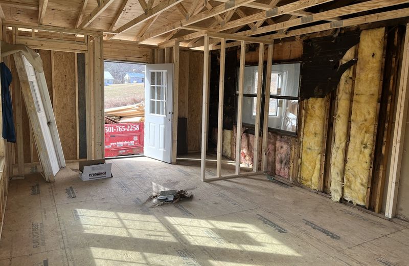 An interior stripped back to the studs during a remodel