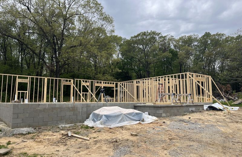 Exterior walls framed and standing on a new foundation